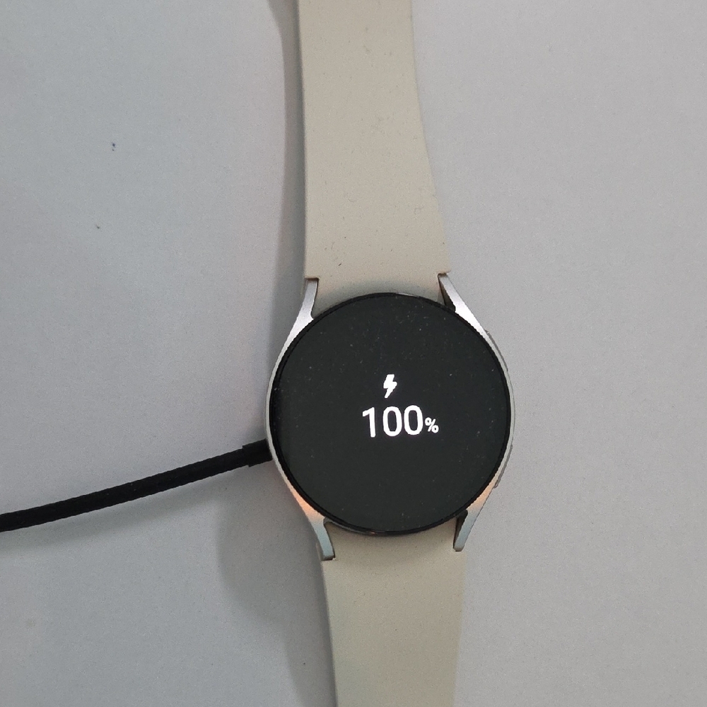 Cream Smartwatch with Minimalist Design and Circular Display